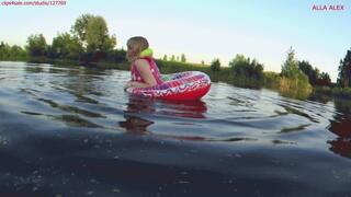 Alla swims on the lake and wears an inflatable vest and plays with an inflatable ring!!!