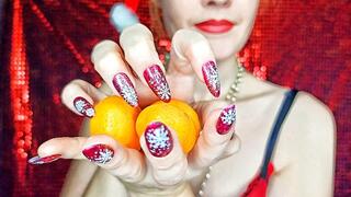 Christmas aesthetic hands fingering tangerines
