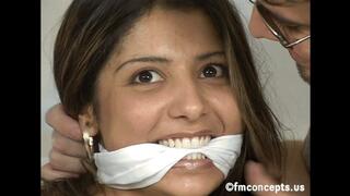 Bound and gagged little brunette Azlyn Farros wriggles and giggles on the floor as her bare soles and torso are tickled!