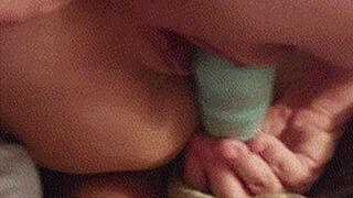 Fucking her with a butt plug from behind