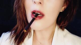 Inhaling elegance smoking an all black cigarette, exhaling dreams with every puff