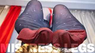 Foot tease in black nylons with white polka dots and red reinforced toes (4K MP4)