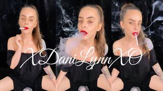 Smoking Marlboro in Black Dress