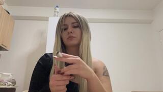 Smoking a cigarette while teasing you with my mouth