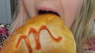 Adorable Girl Eating a Cream Cheese Filled Guava Bun