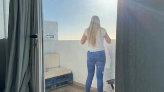 Girl stuck on balcony and has to pee in jeans
