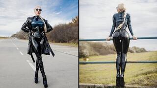 Katya walking outdoors in totally shiny outfit