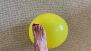 Barefoot balloon play and pop