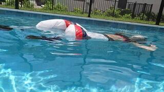 Kilo Swims in Two Nylon Outfits