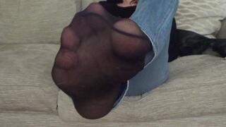 Black pantyhose and pretty toes