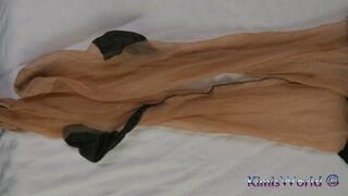 Showing feet in tan stockings