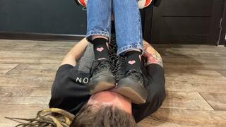 Slave's face as a footstool under dirty Vans, sweaty socks and bare feet