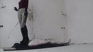 My slave lies mummified, I step on his face, walk on him, trample him, jump on him I do whatever I want with him