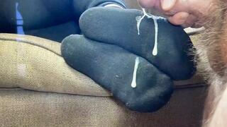 Cumming on her socks