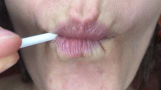 crushing a lollipop with my strong teeth