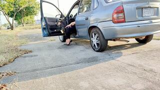 Diana Senior Cold Starting the Chevy Corsa on Black Classic Pumps