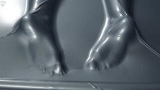 Tickling and flogging feet in a gray latex bed