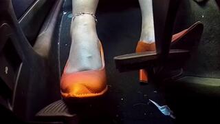 Driving my Luxury SUV in Orange Heels with one foot on the accelerator and one foot on the brake (Part 1)