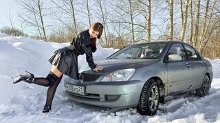 CAR STUCK Worn out tires and snow - Ellie stuck in a short dress