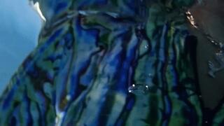 Slow motion Abalone dive skin swim in the pool