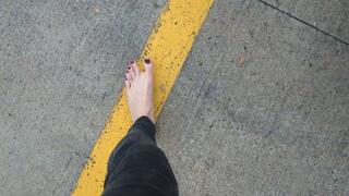 Fifi fast driving barefoot in skinny black jeans with jewelry