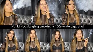 Hot bimbo dangling smoking a 100s white cigarette!