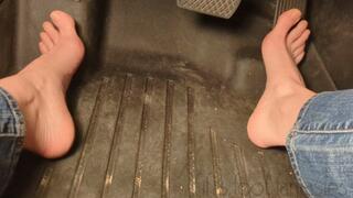 Fifi pedal pumping in sedan barefoot with blue jeans