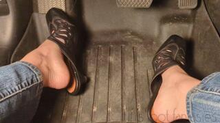 Fifi pedal pumping in slip on leather mules sandals and blue jeans