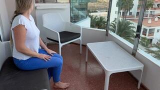 Desperate pee in jeans on balcony from MILF