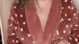 Erotic smoking on a robe, panties and bra, cork cigarette