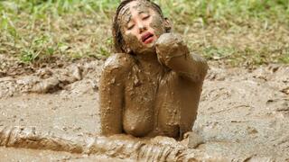 Nina Enjoys Mud Pole Arousal
