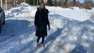 girl in high-heeled shoes and straps climbs an ice slide, falls and twists her foot, now she can’t walk