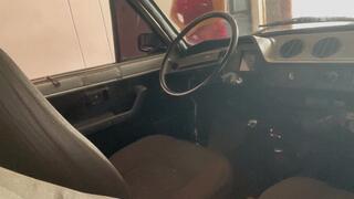 Barbara is going to put gasoline with great difficulty