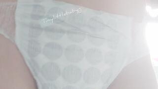 Very worn white pull up pissing