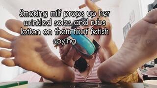 HD Smoking milf props up her wrinkled soles and rubs lotion on them foot fetish spying