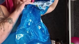 blowing inflateble whale and nacked riding