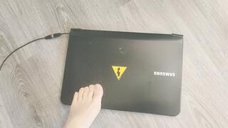 Affectionately Crushing a laptop