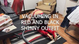 MISTRESS VACUUMING IN RED AND BLACK SHINNY LEATHER