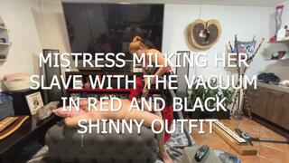 MISTRESS MILKING HER SLAVE WITH THE VACUUM IN RED AND BLACK SHINNY LEATHER POV 1