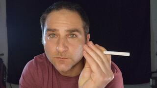 Close up hot guy smoking Marlboro Red 100 cigarette