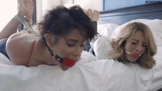 Sexy moaning secretary Enchantress Sahrye and Alba Zevon hogtied and ball gagged in Slow MOtion