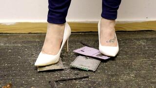 kobo e-reader tablet crush under white high heel stilettos