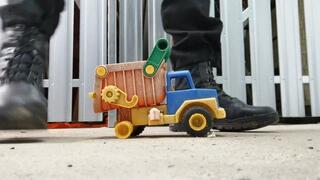 Security Guard crushing Toy Truck