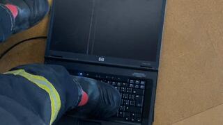 Firefighter crushing a Laptop 2