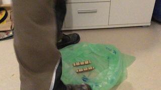 Worker stomping some Food with Work Boots