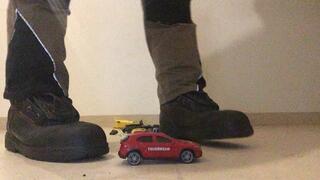Worker stomping Toy Car