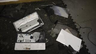 Laptop crushing with black metal heel metal tipped stiletto high heels