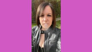 SMOKING IN LEATHER JACKET