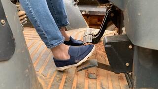 Watch me stomp and rev the hell out of the backhoe, and catch a peak at my dirty smelly feet