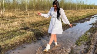 HIGH HEELS Christina walks through deep puddles in high heels